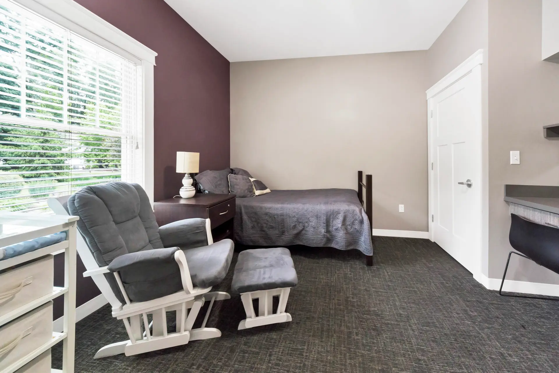 Private bedroom with single bed and seating at Oak House