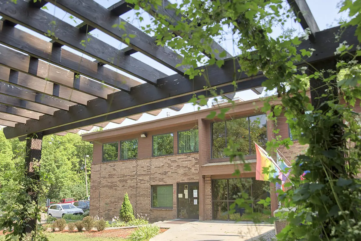 Front entrance of Pride Institute with rainbow flags