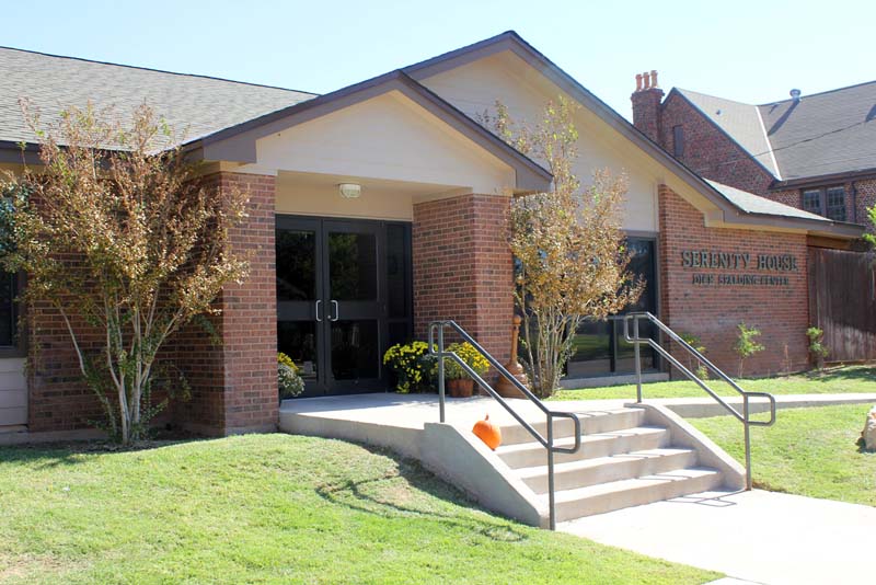Primary exterior of Serenity House showing front entrance and ramp