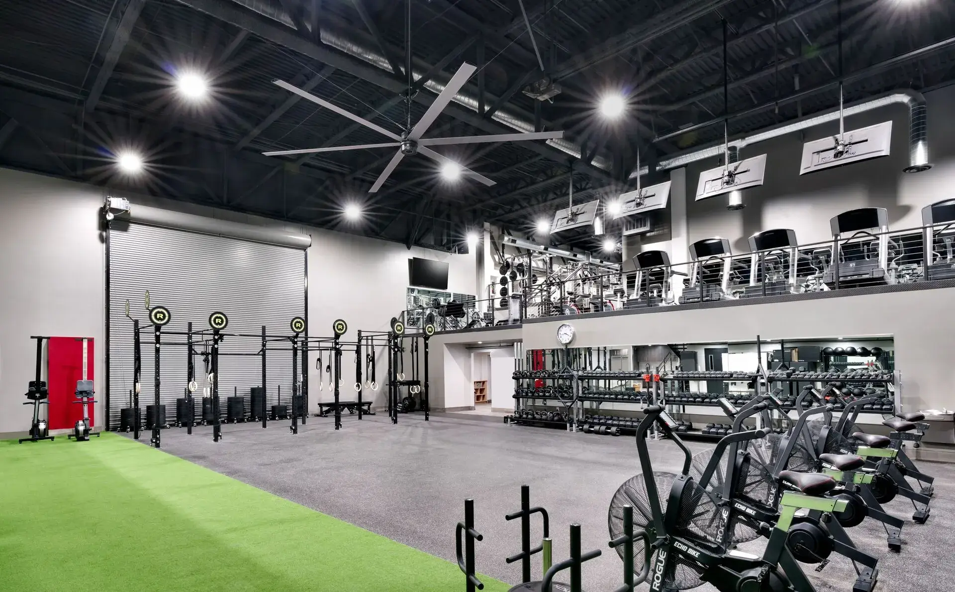 Gym with cardio machines and a weightlifting area