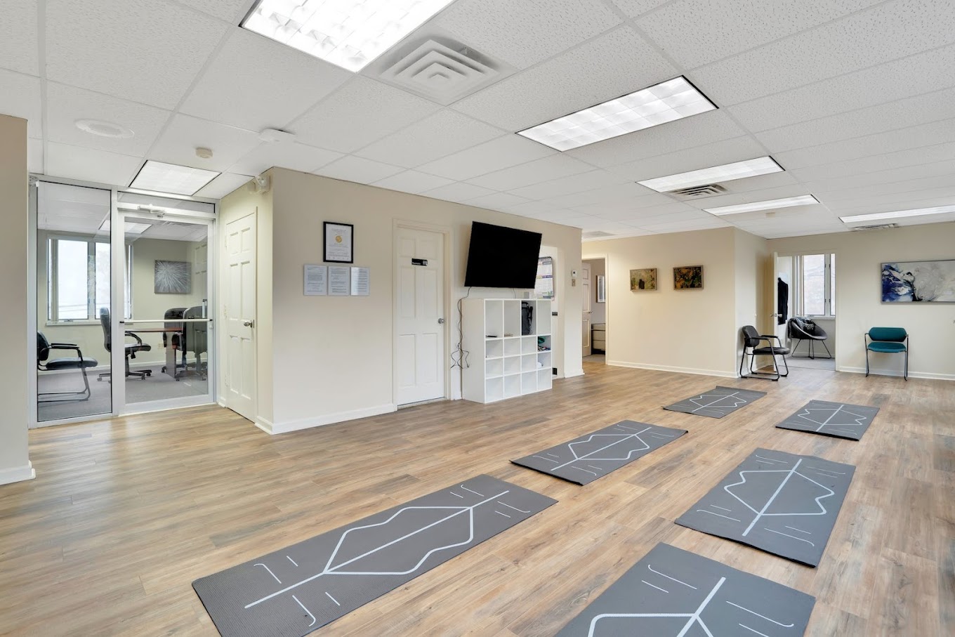 Yoga and meditation room with floor mats.