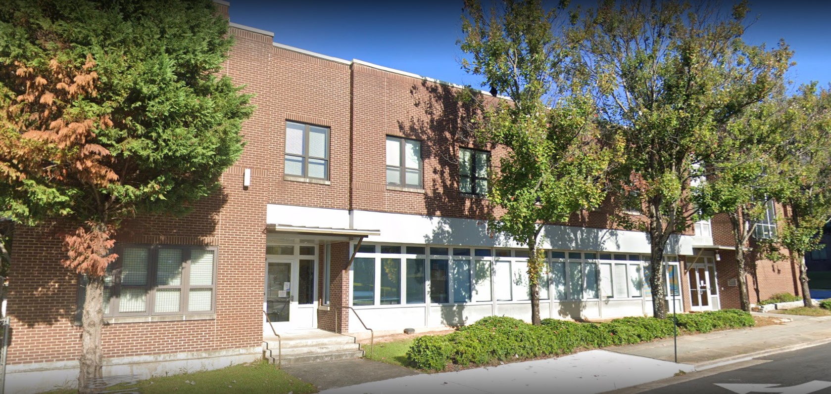 Exterior view of the rehab facility building front entrance.