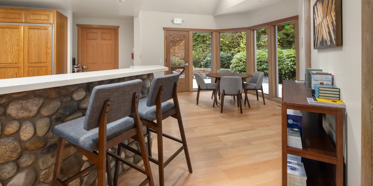 Cozy bar and dining area with large windows