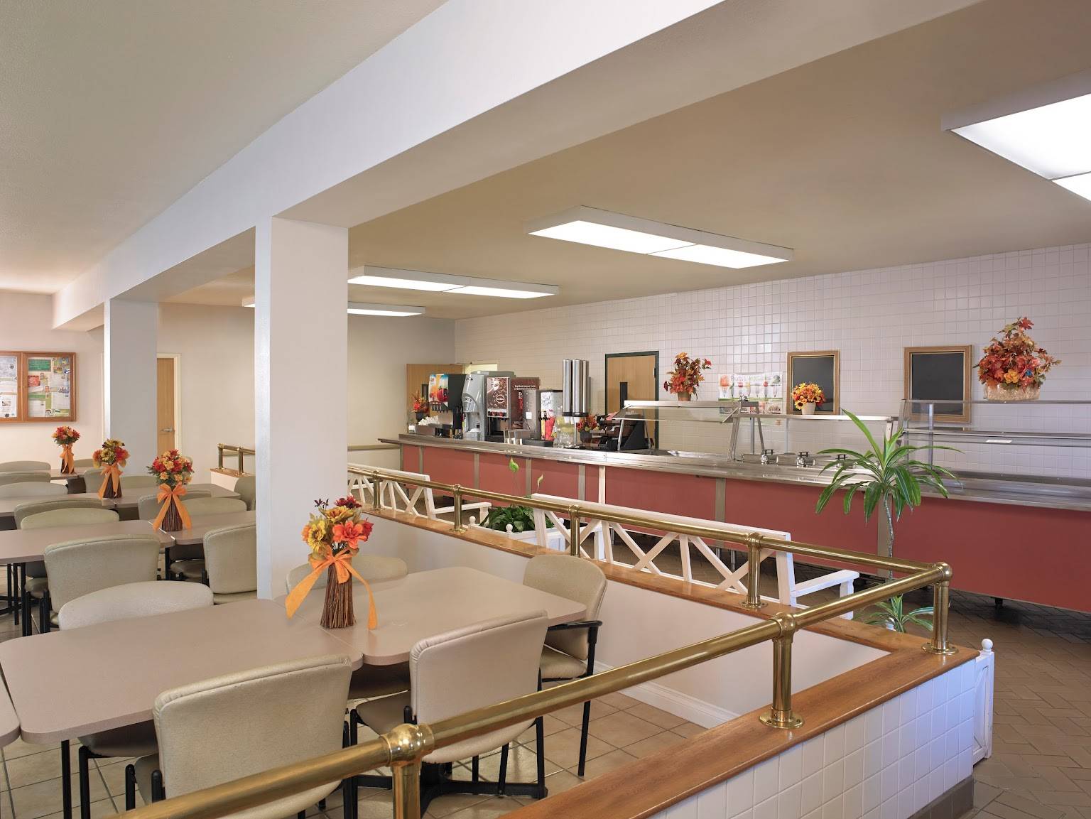 Cafeteria with dining tables and fall decorations