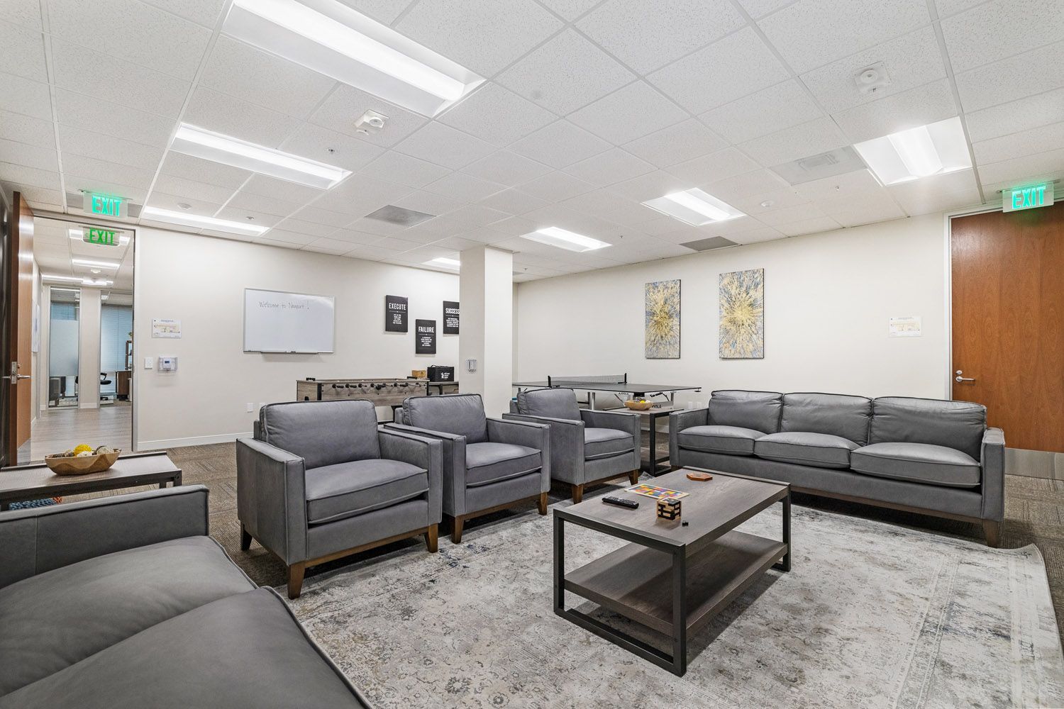 Game room with lounge seating and foosball table