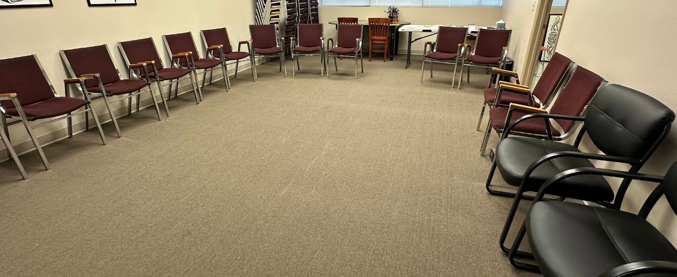 Meeting room with chairs arranged for group sessions
