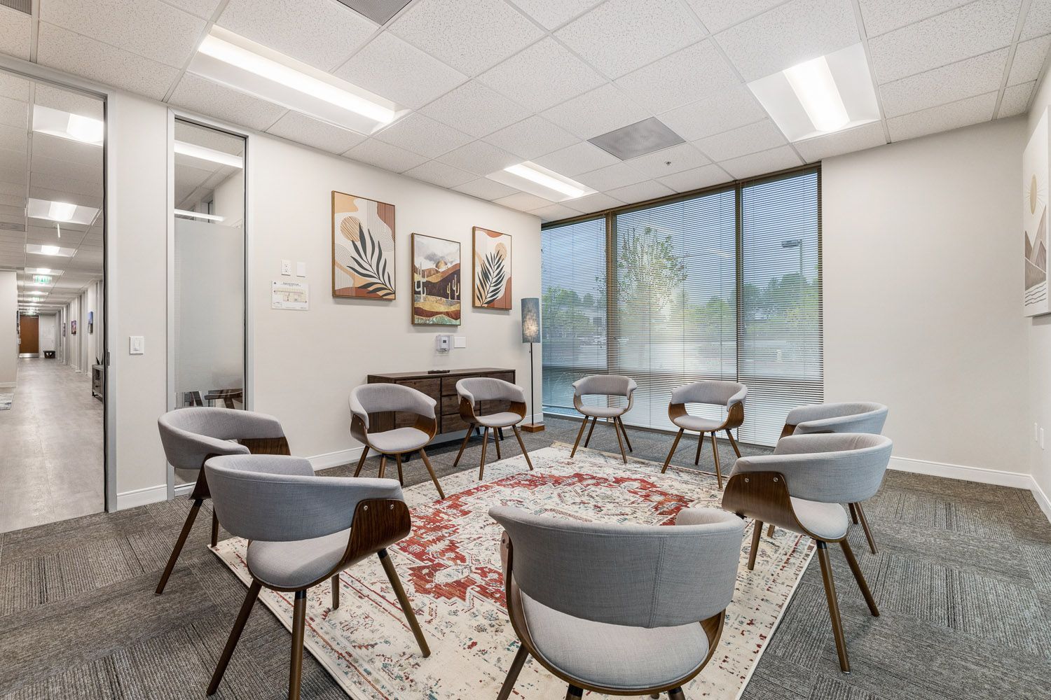 Group therapy room with chairs arranged in a circle