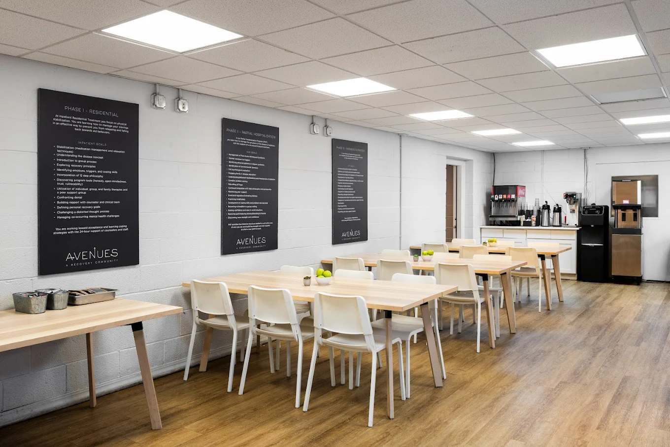 Bright dining room with wooden tables and drink station