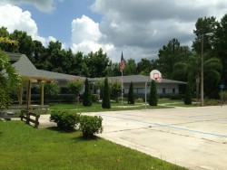 Outdoor basketball court and courtyard at The Grove adolescent treatment center