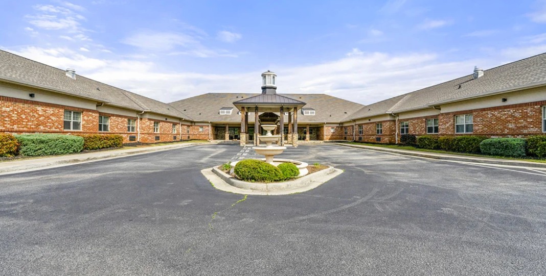 Exterior view of the Promises Dallas–Fort Worth campus featuring landscaped grounds and central entrance