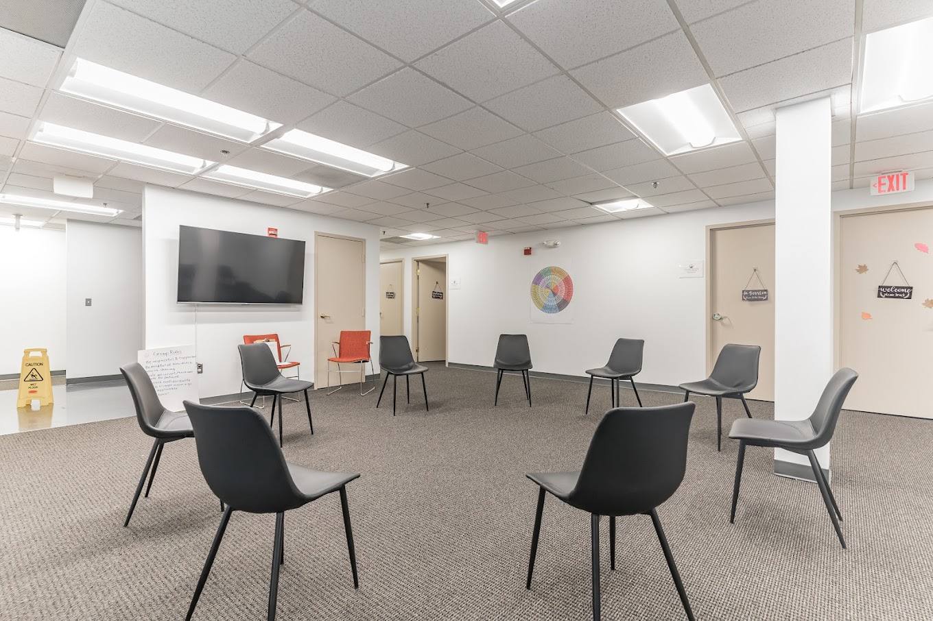 Group therapy room with chairs arranged in a circle