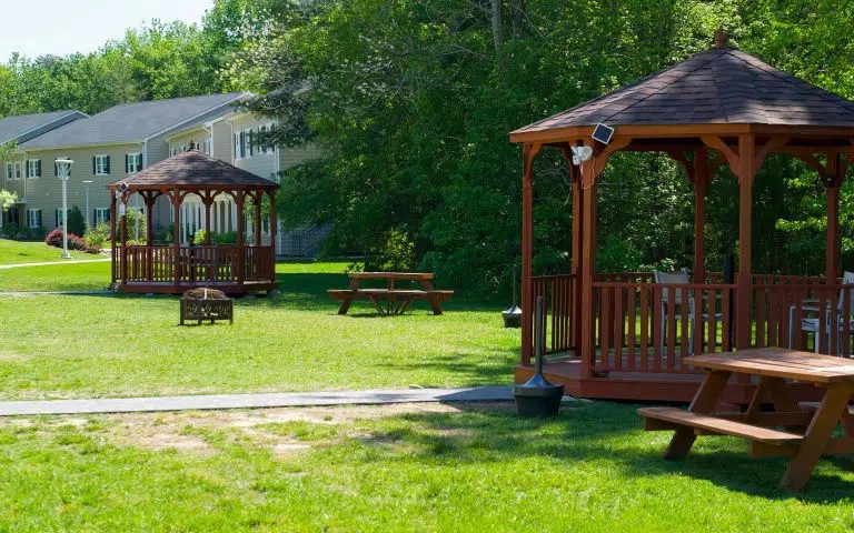 Outdoor view with gazebos and picnic tables.