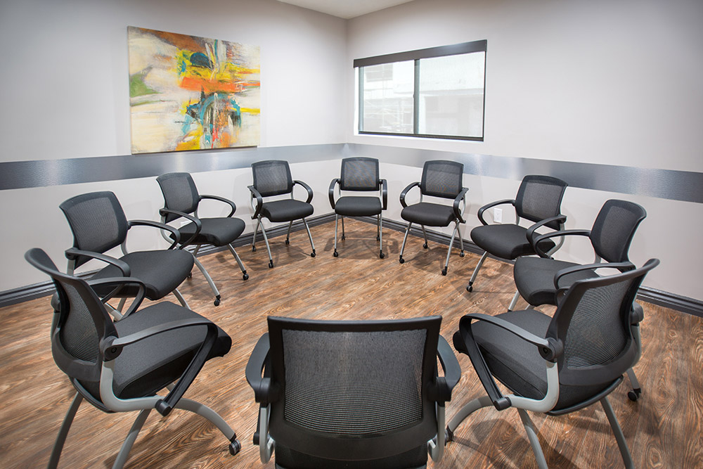 Group meeting room with chairs in a circle at Chabad Treatment Center
