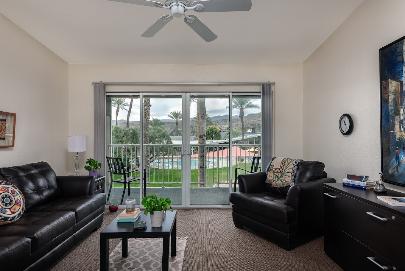 Lounge with pool view and leather sofas