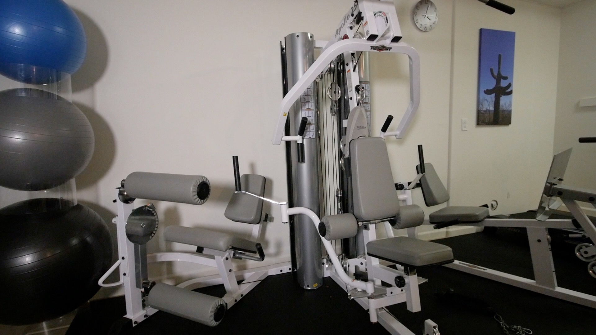 Exercise machine and stability balls in a fitness room