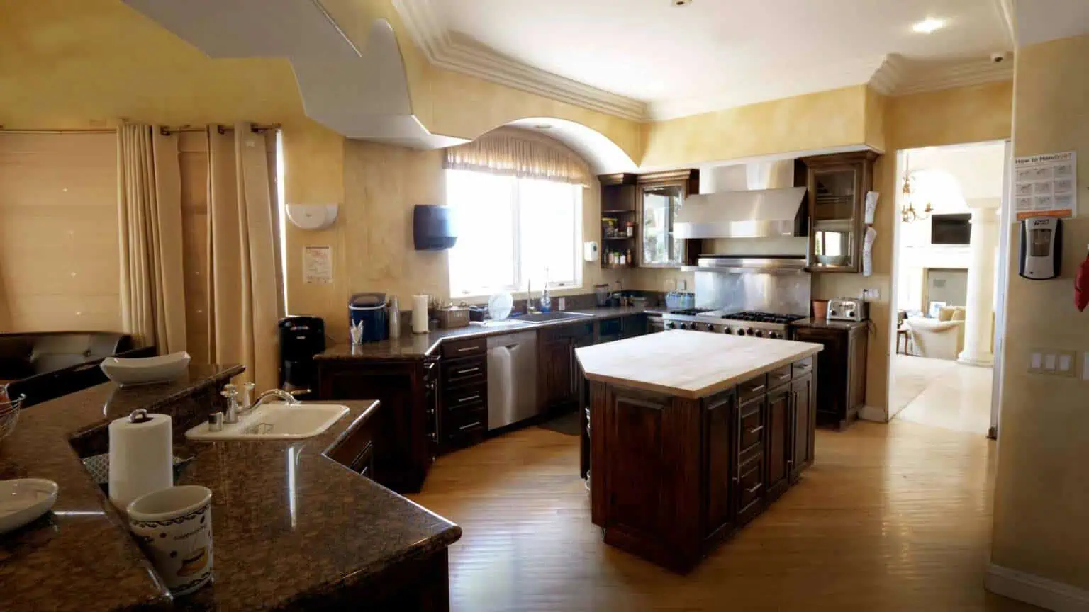 Spacious kitchen with wood cabinets and center island