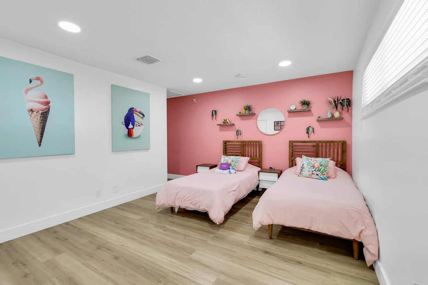 Shared bedroom with twin beds and colorful décor