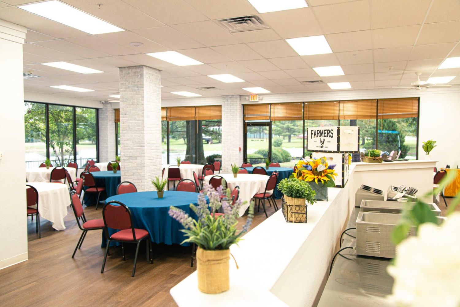 Dining area with tables and chairs.