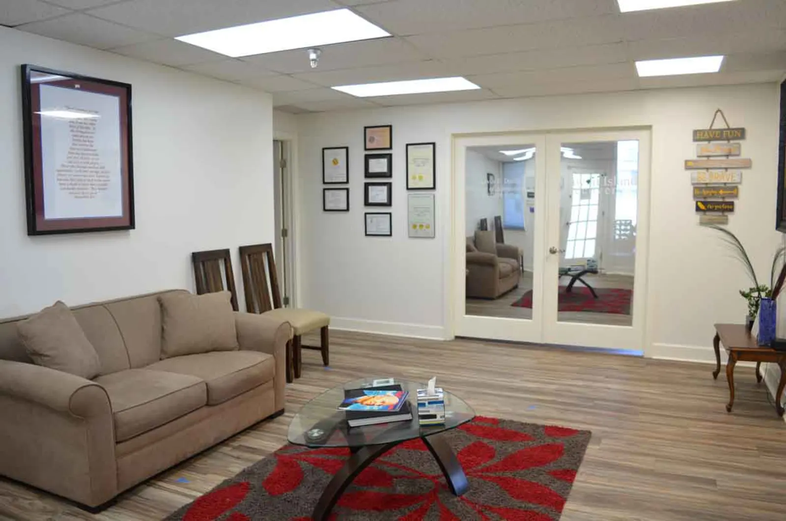 Couch and chairs in bright waiting room