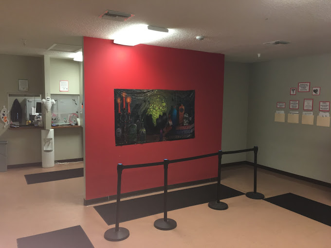 Waiting area with roped-off section.