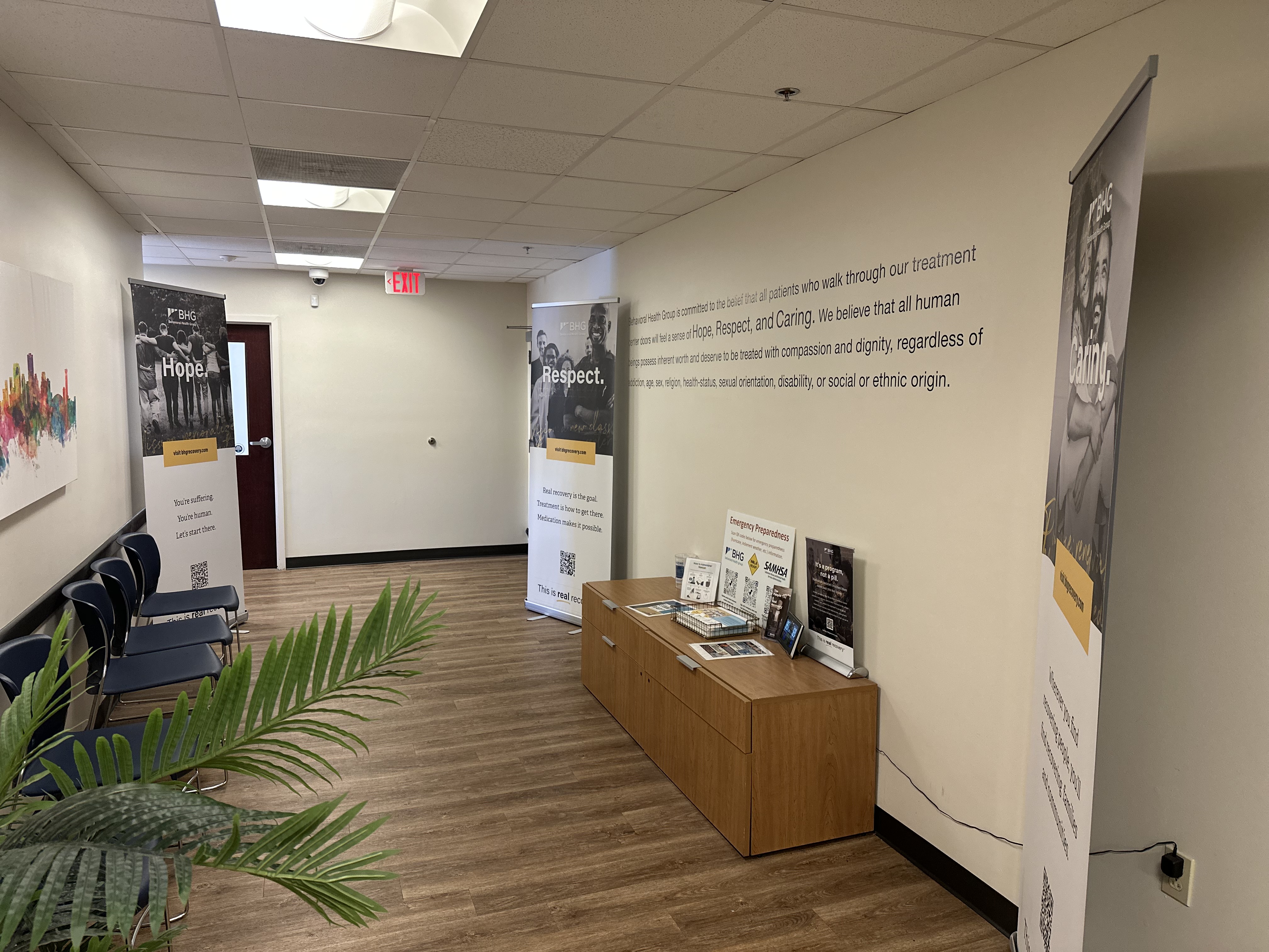Hallway with seating, resource table, and recovery banners