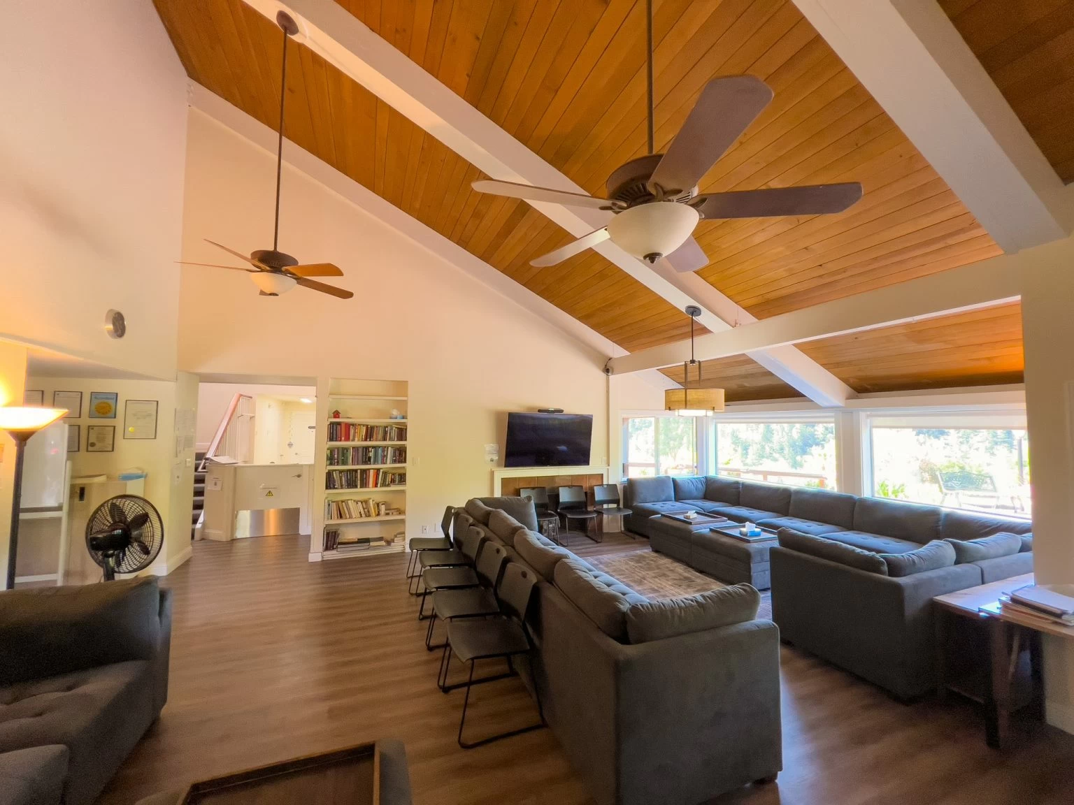 Comfortable living room with couches and large windows