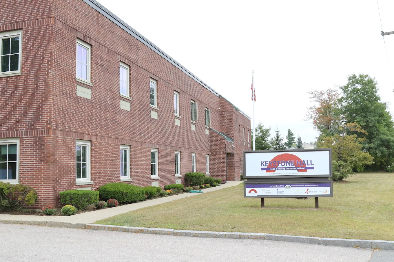 Brick wall building with windows and signage