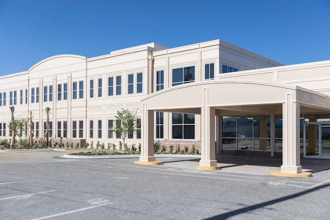 Modern two-story treatment center with covered entryway