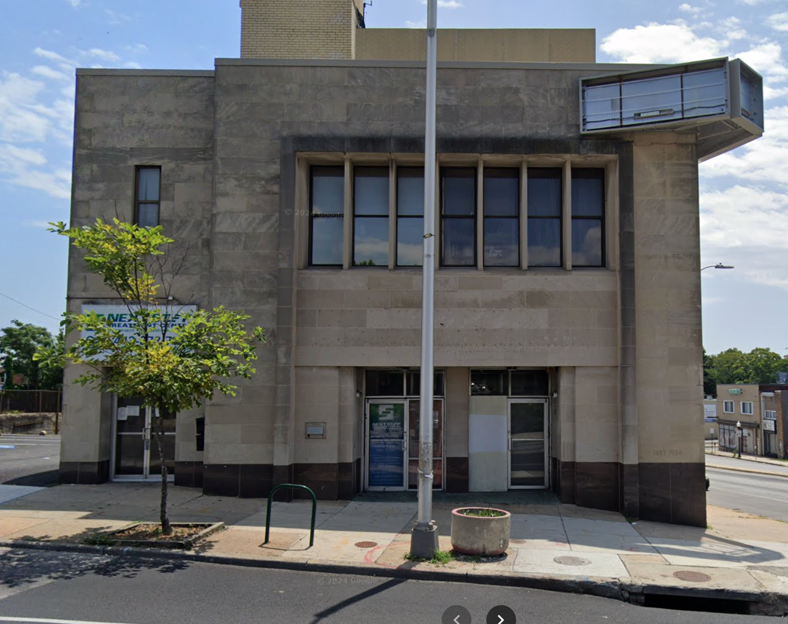 Exterior view of rehab center building from street.