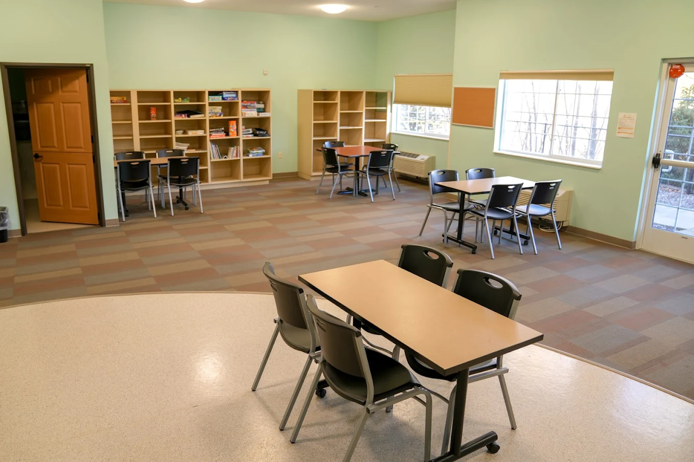 Common study area with bookshelves and seating area