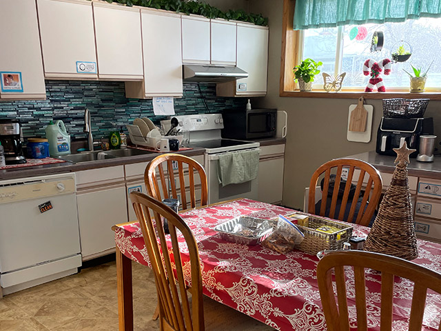 Kitchen with dining table and holiday decor