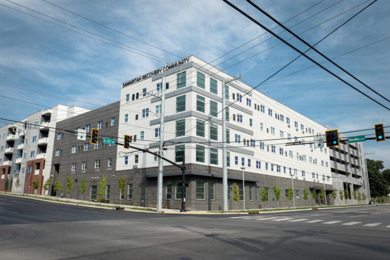 Modern multi-story rehab facility building at street corner in Nashville