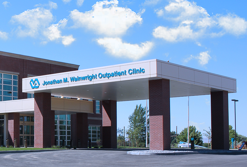Brick VA outpatient clinic entrance with covered driveway