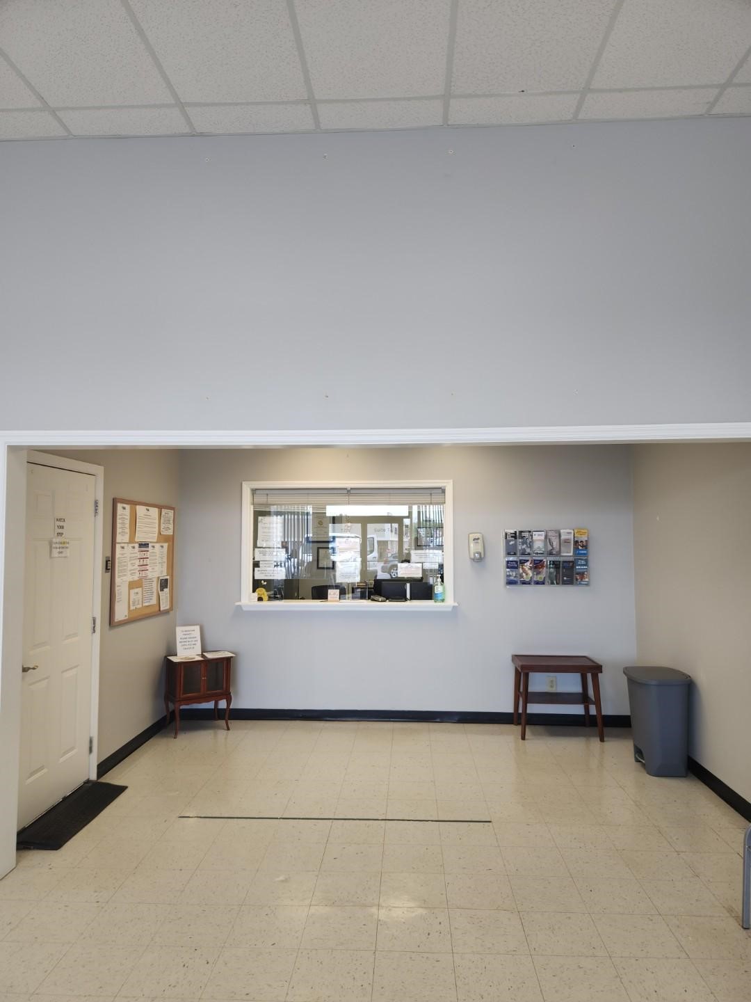 Reception window and check-in area at treatment center