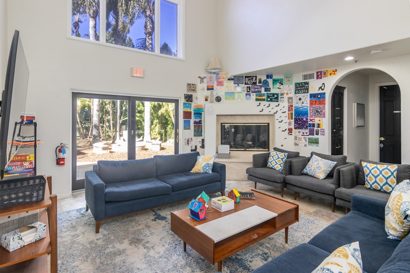 Lounge with sofas and a fireplace.