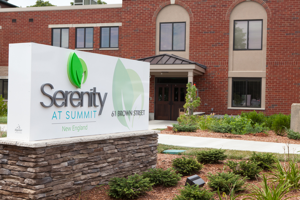 Serenity at Summit logo sign in front of building entrance