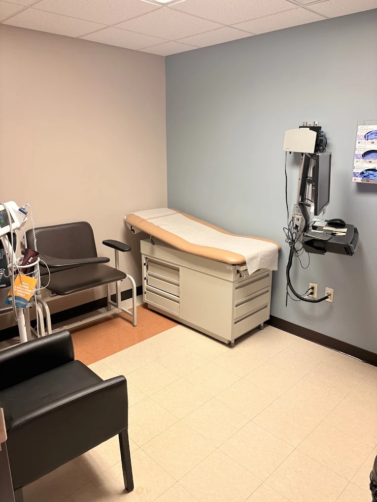 Exam room with medical table and equipment