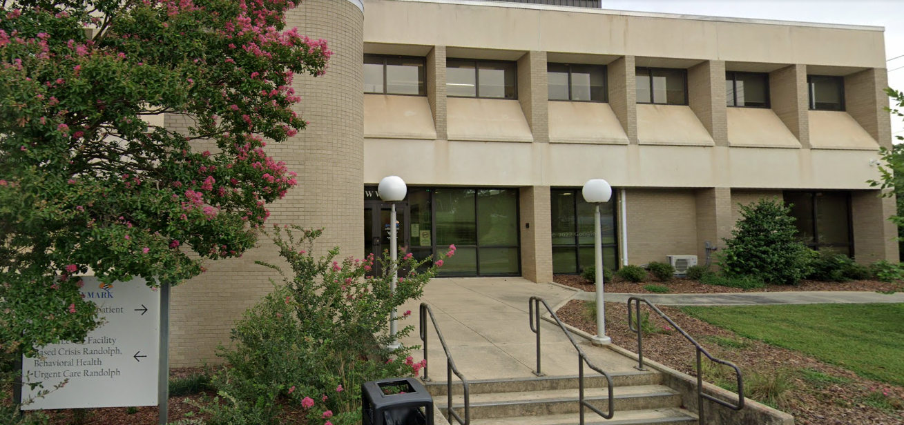 Building exterior with Daymark Recovery Services sign and landscaping