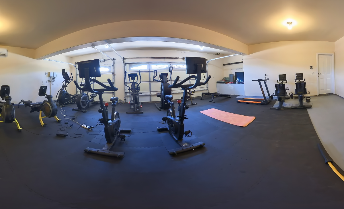 Indoor fitness room with exercise bikes and training equipment