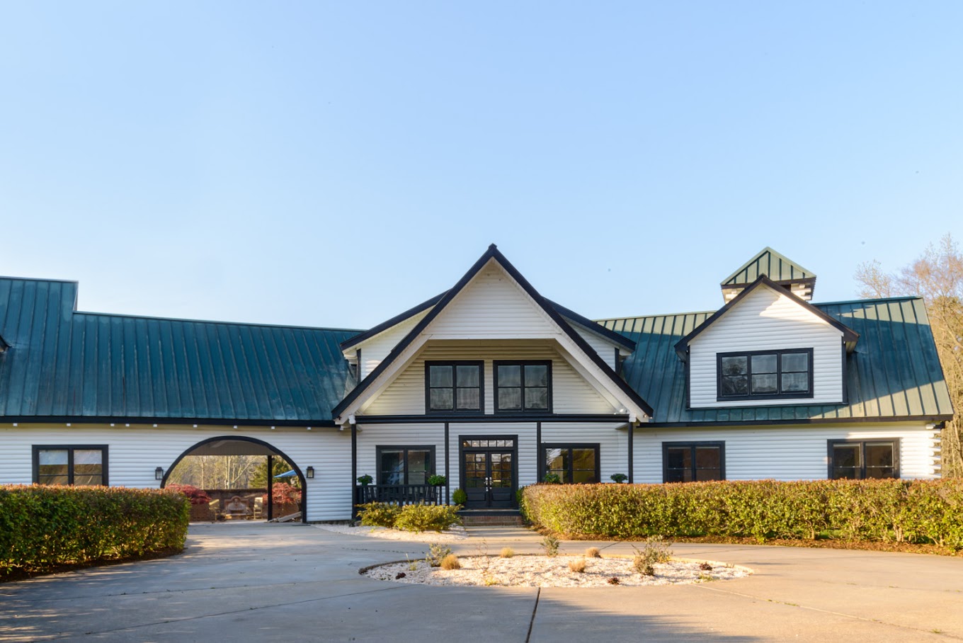 Facility front with entrance and driveway.
