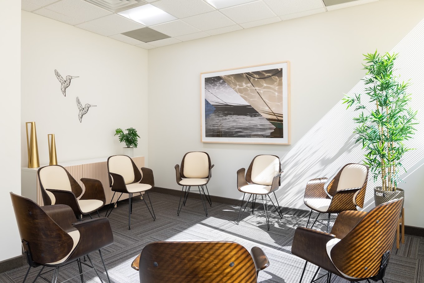 Therapy room with chairs arranged in a circle.
