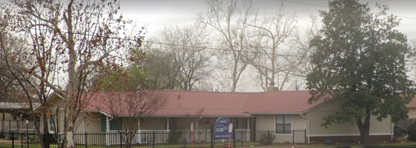 Rehab center exterior with trees and winter foliage