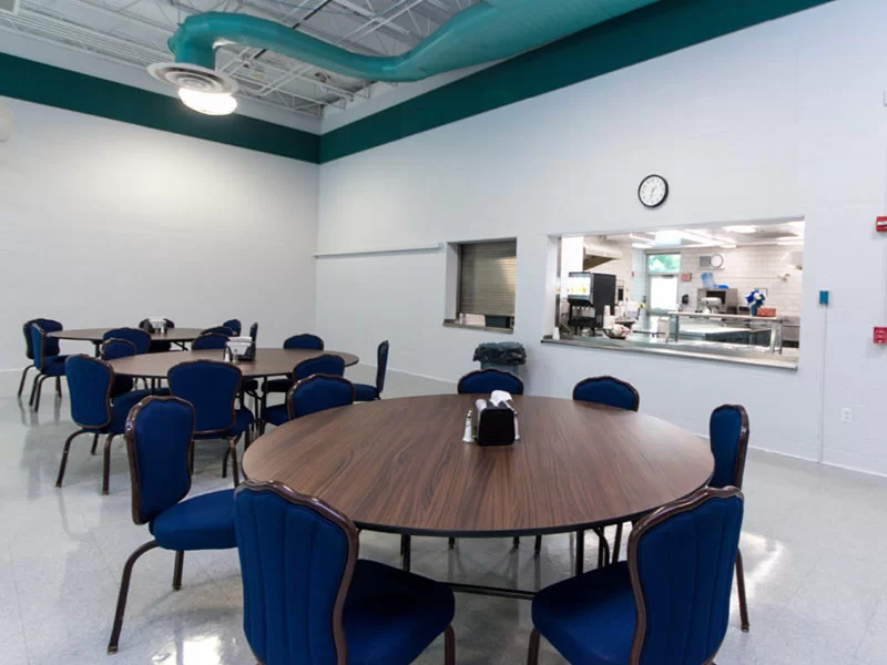 Round tables and kitchen service window