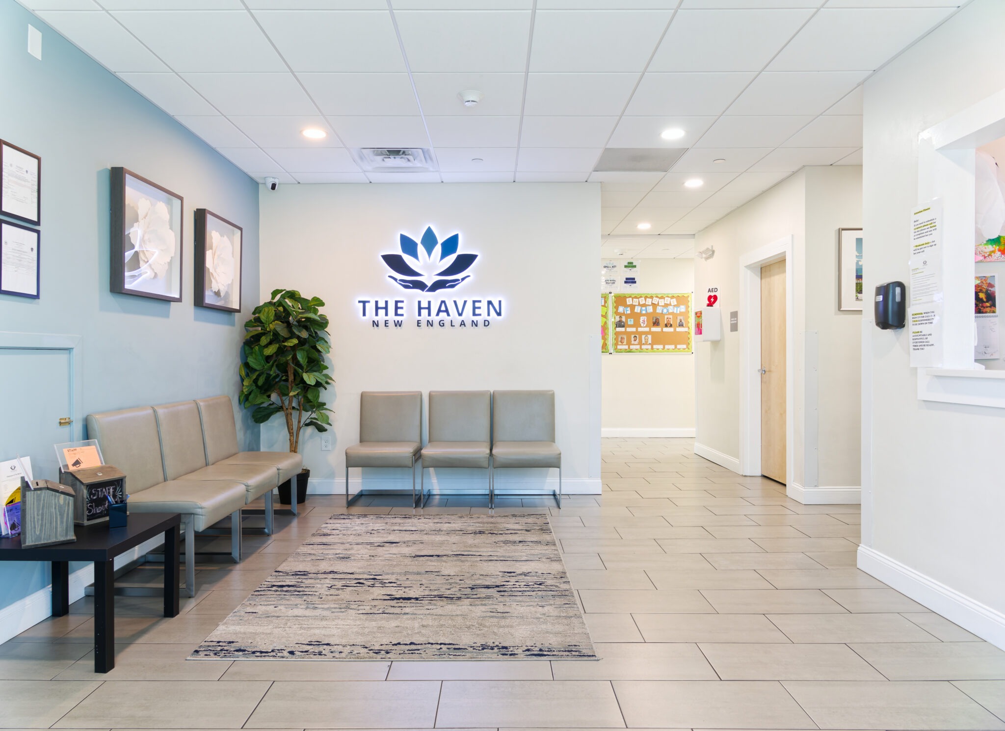 Lobby with seating and The Haven New England sign.