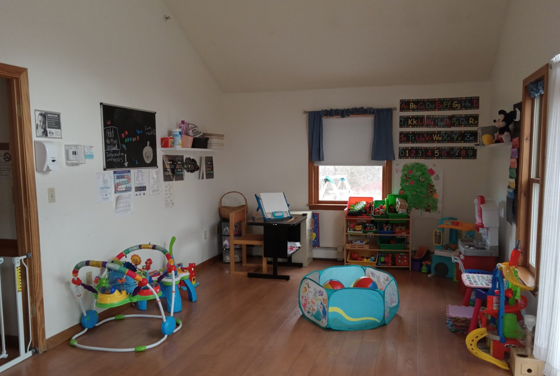 Bright playroom with toys and activity area