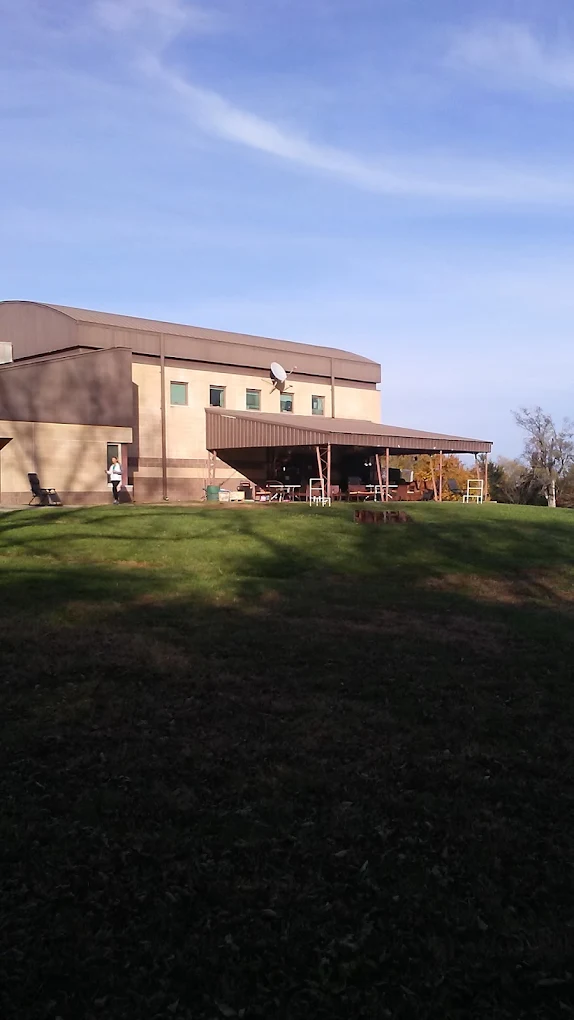Outdoor patio and grassy grounds behind the treatment center