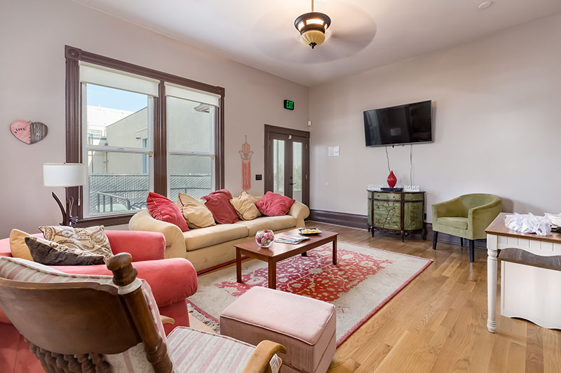 Comfortable living room with couches and television