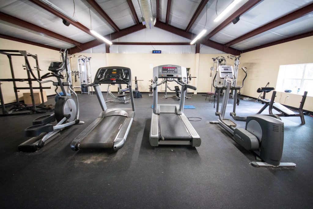 Gym with treadmills and strength equipment