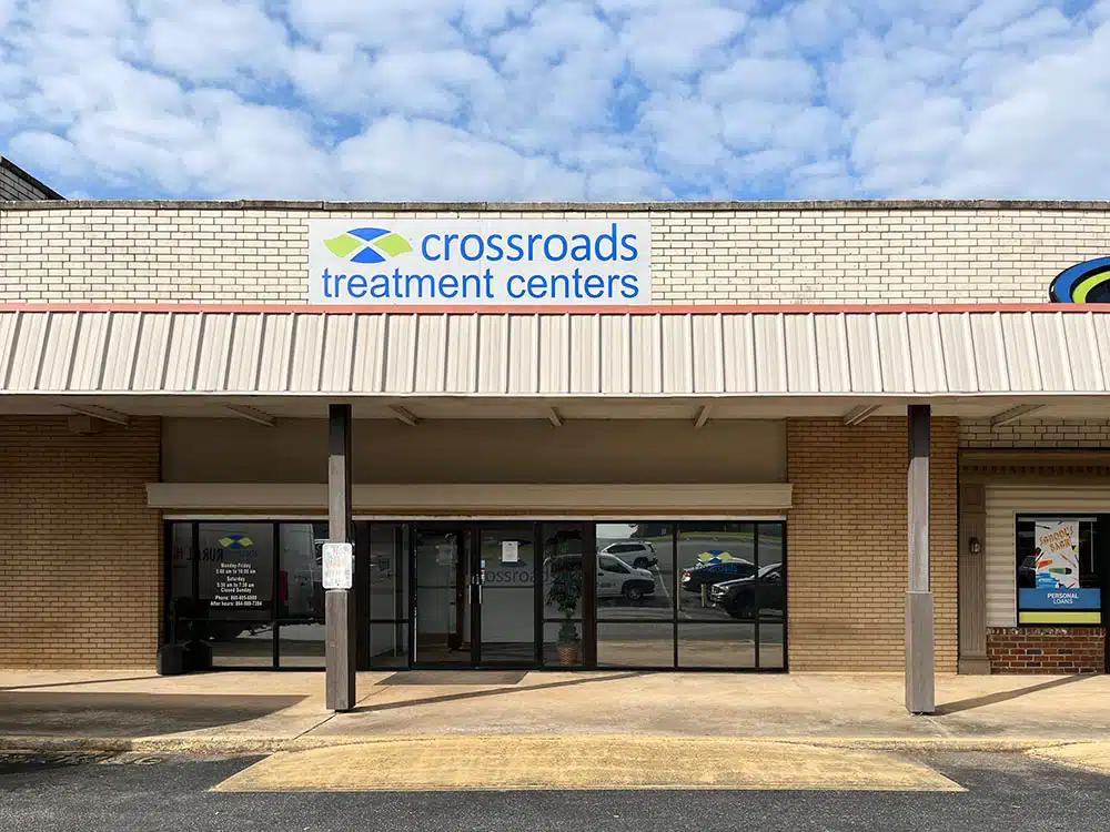 Clinic storefront with Crossroads sign and glass doors