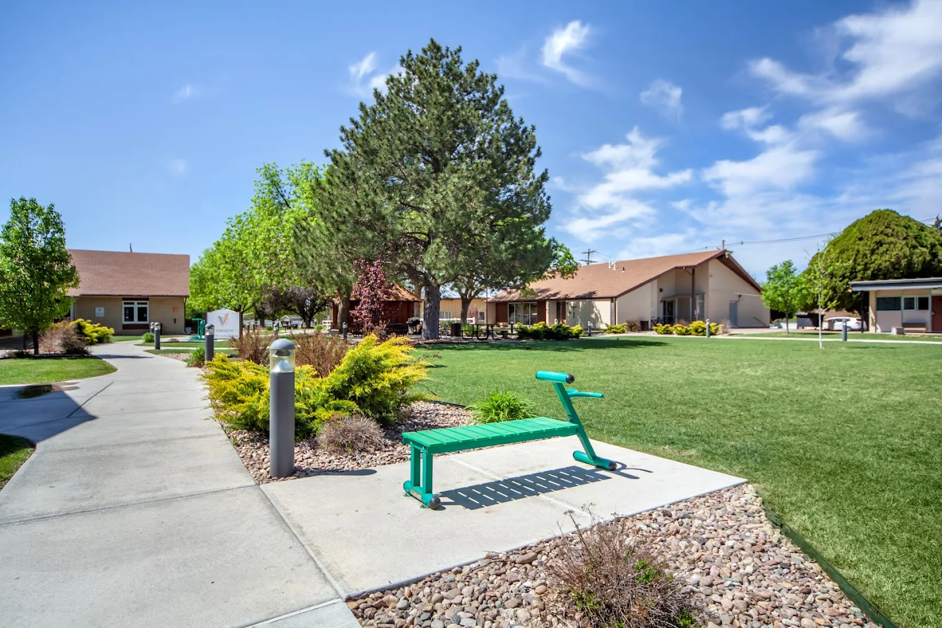 Courtyard with walking paths and outdoor exercise equipment